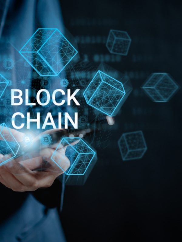 Businesswoman,Use,A,Smartphone,Connecting,To,Blockchain,Global,Networking,,Token